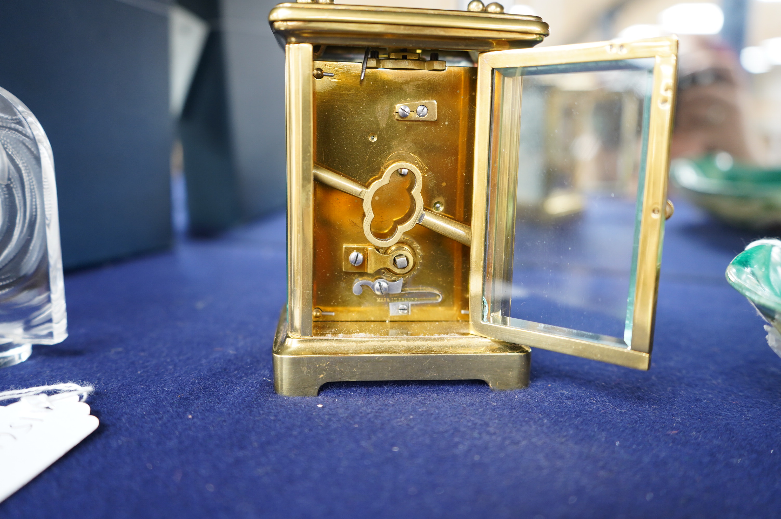 A brass carriage timepiece, 11.5cm high. Condition - good.